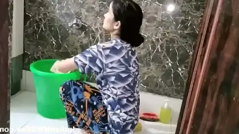 indian wife in bathroom washing and taking shower 1734312019